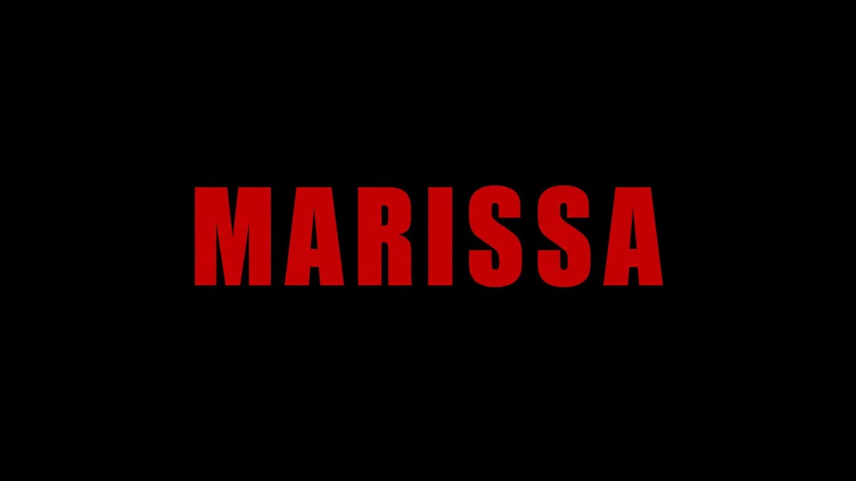 The word MARISSA in large red letters on a black background